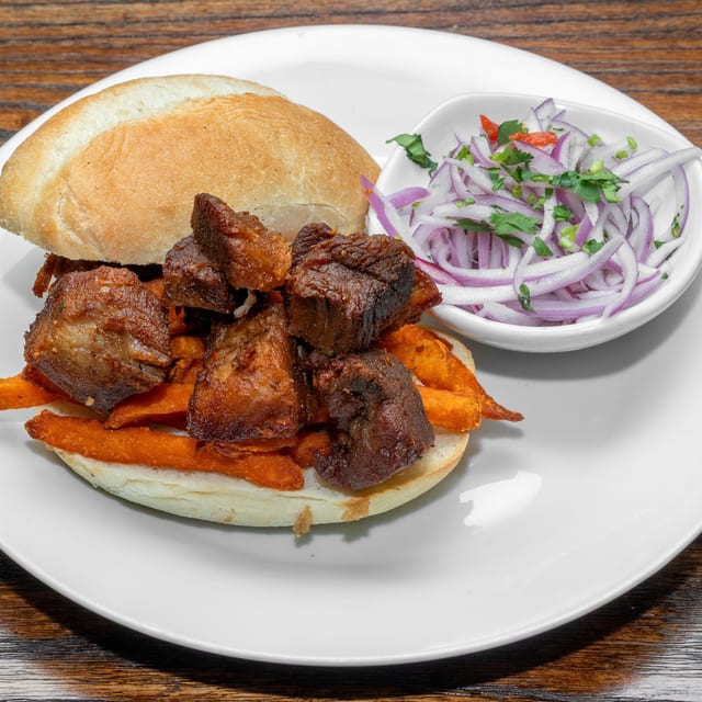 Pan Con Chicharron.
